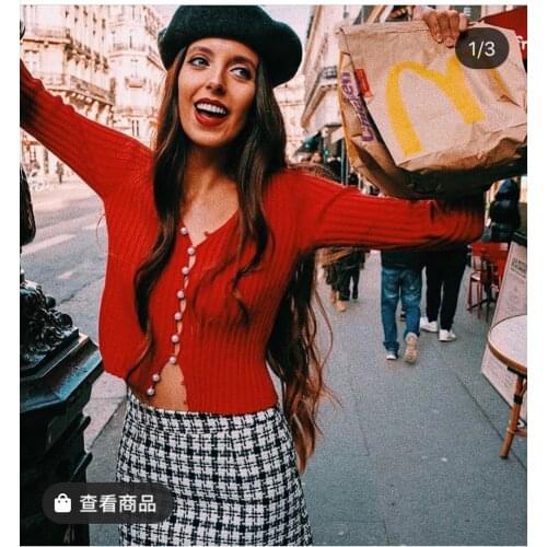 Woman long sleeve pearl sweater