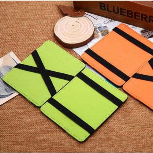 100pcs Creative gift leather short mens multi-card magic card holder European and American leather magic wallet SN3136