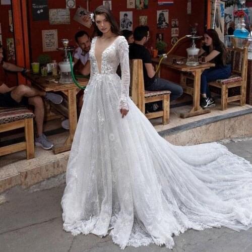 Booma Long Sleeve Lace Wedding Dresses Boho 2020 Deep V-neck Open Back Sleeveless Beach Bridal Gowns Long Train A-line Plus Size