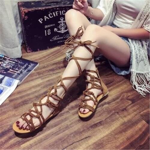 In the summer of 2019, the new flat heel Boots, womens cross bands with the Roman style of pure color peep-toe Boots