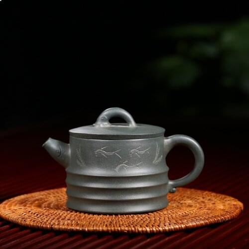 Recommended le kung fu tea set manufacturers selling yixing tea set manually fish craftsmen made a undertakes the teapot