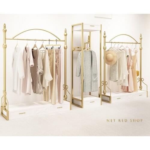Design and decoration of European clothing store display rack in womens clothing store golden shelf shop