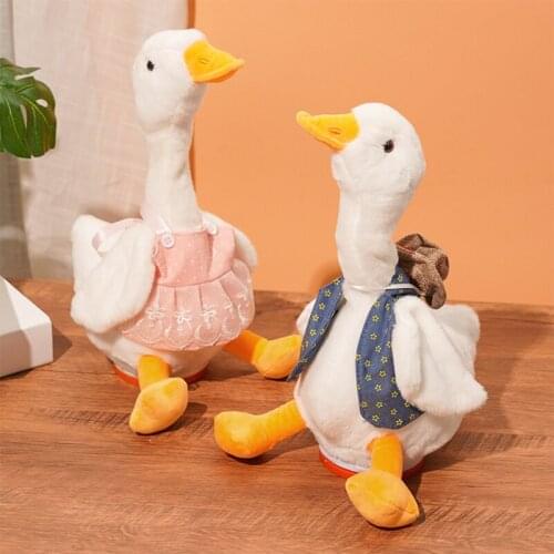 Products in Stock New Childrens Toys Sand Carving Duck Music Plush Doll Toy Shaking Head Duck Stall Wholesale