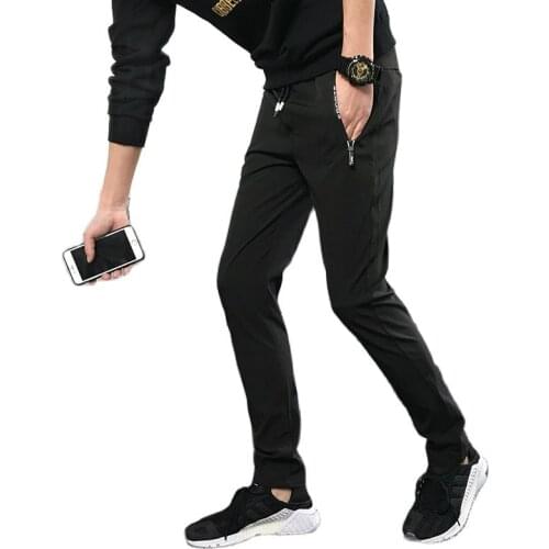 Spring casual sports pants fashion mens casual pants slim legs open mens pants