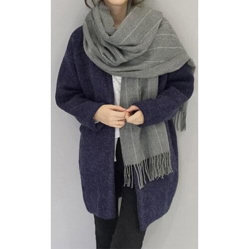 Mingjiebihuo New winter Korean fashion wool handmade solid color scarf thickening men and women couple knitted tassel scarf