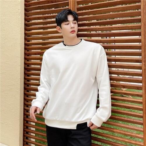 Autumn mens fake two-piece Pullover black and white splicing destructive design Korean fashion mens loose casual coat
