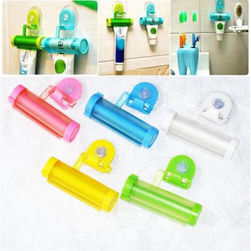 1 PCS Creative Rolling Squeezer Toothpaste Dispenser Tube Partner Sucker Hanging Holde distributeur dentifrice 5colors