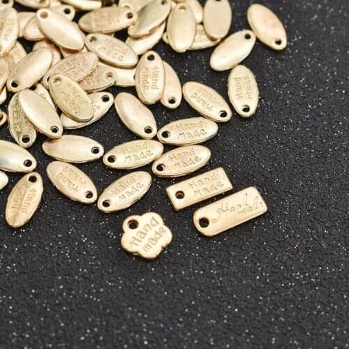 100Pcs/lot 4 Styles Gold Color Alloy Metal Handmade Labels Tags For Garment Bags DIY Sewing Materials