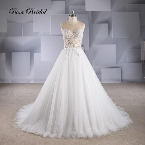Rosabridal A line wedding dress China custom made O neck illusion beading lace appliques on nude tulle bodice German like