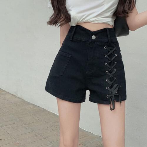 Spot China summer new personality fashion high waist solid color show thin cross lace stretch jean shorts