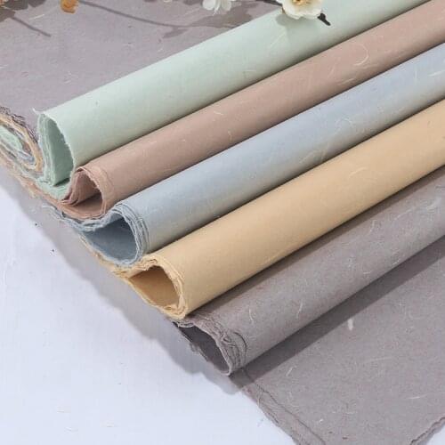 50 Sheets Yunlong Rice Paper Half-Ripe Xuan Paper Chinese Calligraphy Pupi Fiber Rice Paper with Flowers and Plants Pattern