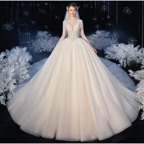 New Arrival Tulle Short Sleeve V Neck China Bridal Gowns Full Beading Pearls In Bust Princess Wedding Dresses Chapel Train