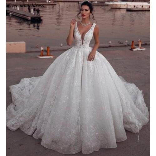 Luxury Lace Princess Wedding Dresses 2021 V-Neck Backless Ball Gown Court Train Arabic Vestidos De Noiva Robe De Mariage
