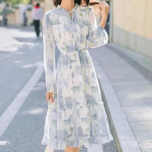 French spring and autumn dress ladies fresh floral V-neck lantern sleeve waist mid-length dress ladies 2021