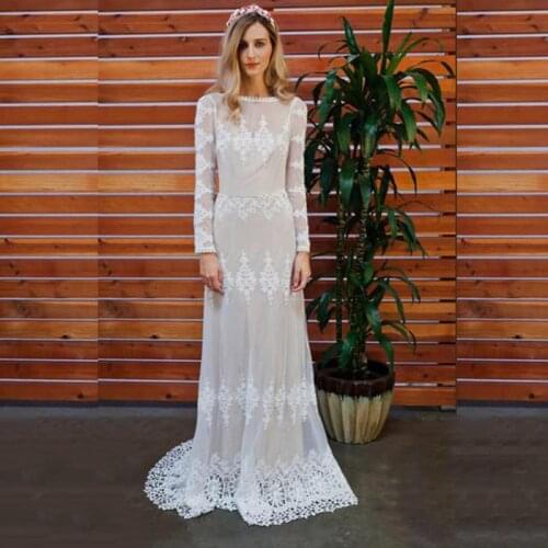 New Arrival Exquisite Lace Long Sleeve Bridal Wedding Dresses Backless Bateau Neckline Wedding Gowns for Bride Sweep Train 2021