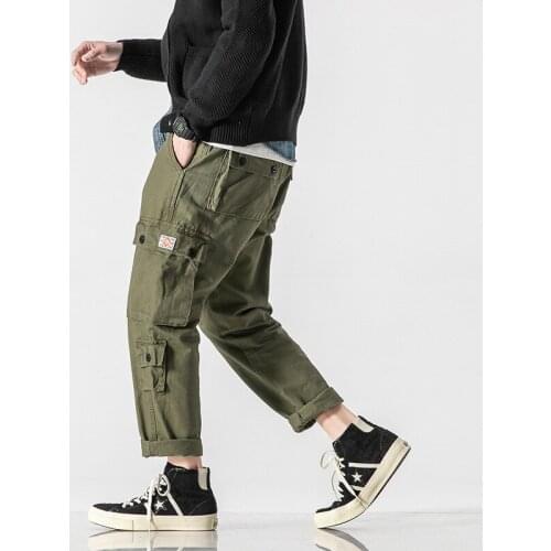 Mens multi-pocket cargo pants for spring 2021 Loose, straight leg slacks European and American fashion street mens clothing