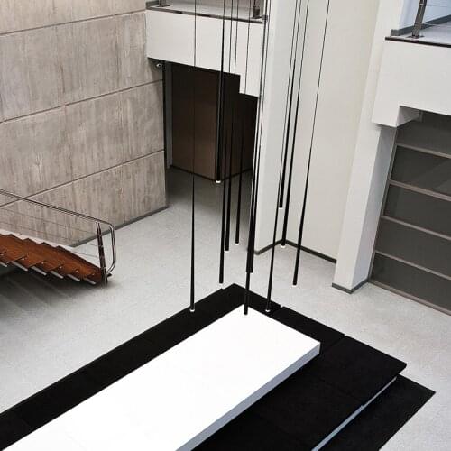 Post-modern stairwell hollow minimalist hanging lamp Art restaurant bar creative long cylindrical cone chandelier