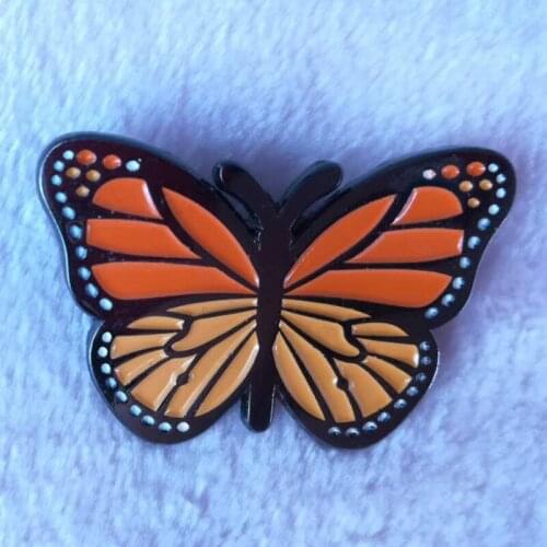 A beautiful gold monarch butterfly enamel pin cute animal brooch gift for Nature lover