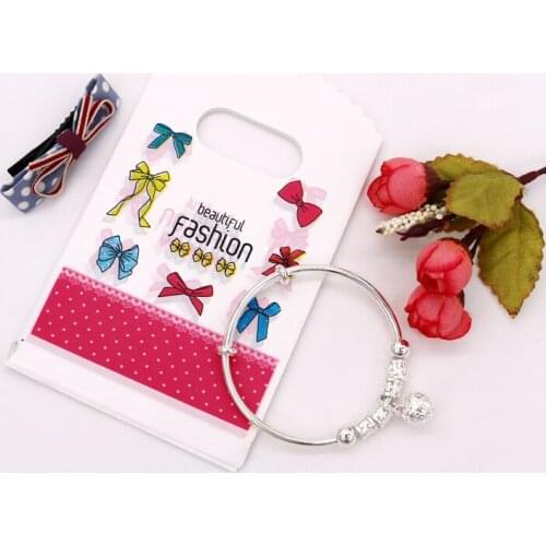 100pcs Bags Colorful Printing bow Plastic shopping Bags for Jewelry accessories Packaging display plastic Material 9*15cm