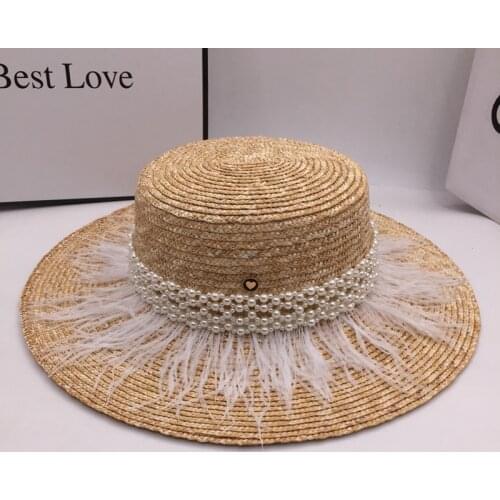 Summer new straw hat hand made catwalk feather gift hat sanya wind sun hats is prevented bask in han edition of England