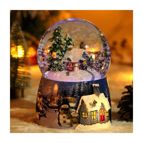 Christmas ball from snow Snow globe snow crystal ball automatic snow falling new year