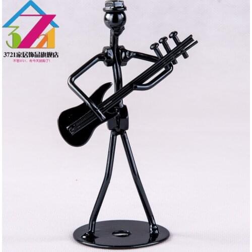 The living room decoration Home Furnishing creative ornaments TV cabinet decorations cute crafts Ironman electric bass band