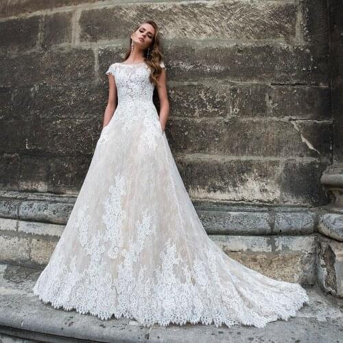 Beading Appliques Lace Princess Wedding Dress With Pockets China Vestido De Noiva O-neck Cap Sleeve Backless A-line Bridal Gowns