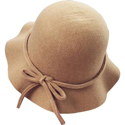 Autumn and winter wavy bow bow hat retro woolen hat casual wild temperament shade Solid color hat female girl 2MZ35