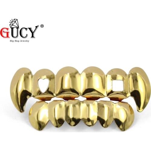 GUCY New Fit Top Hollow Heart n Square Bottom Love Teeth Grillz Set Vampire Fangs High Quality Hip Hop Tooth Grills