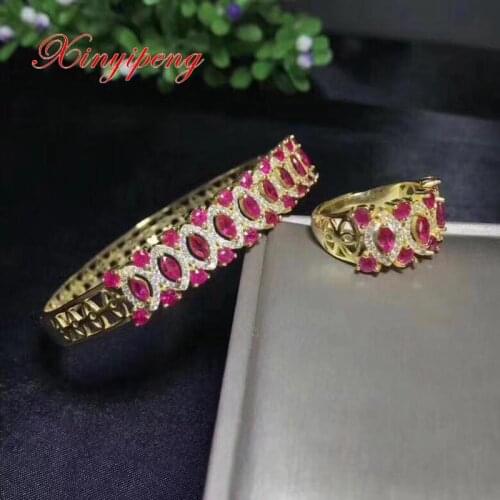 Xin yi peng 925 silver inlaid natural ruby jewelry bracelet ring set style women beautiful