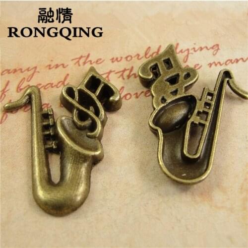 RONGQING 21*30MM Antique Bronze Saxophone Charms 50pcs/lot Horn Musical Instruments Jewelry Charms