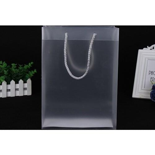 30pcs. new creative pp plastic gift packaging bags with handle wedding party favors bags portable plastic transparent gift bags