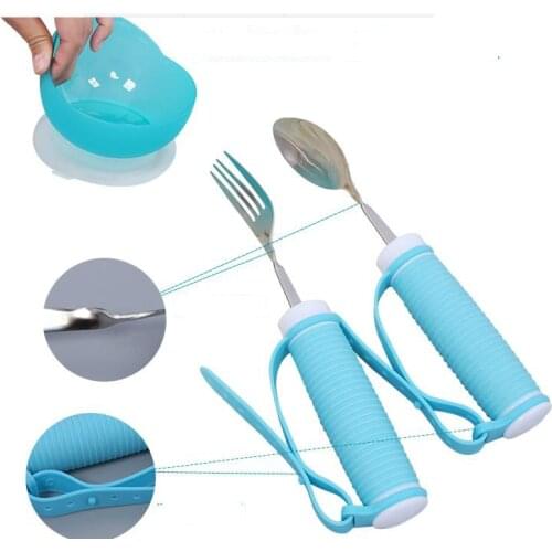 Old man hand disability to help feed a fork protectors patient care disability old man eating dinner