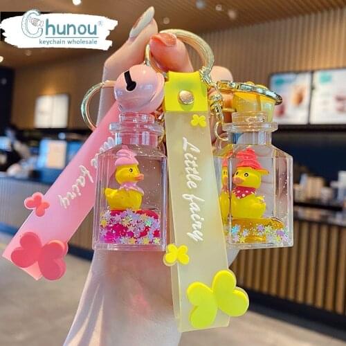Luxury Cute Liquid Yellow Duck Keychain Liquid Drift Bottle Quicksand Key Chain for woman Bag Car Key Chains Pendant wholesale
