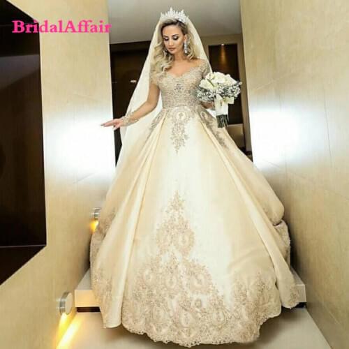 2021 Gorgeous Sheer Long Sleeves Ball Gowns Wedding Dresses Lace Appliques Beaded Bridal Gowns Long Robe De Marriage Plus Size