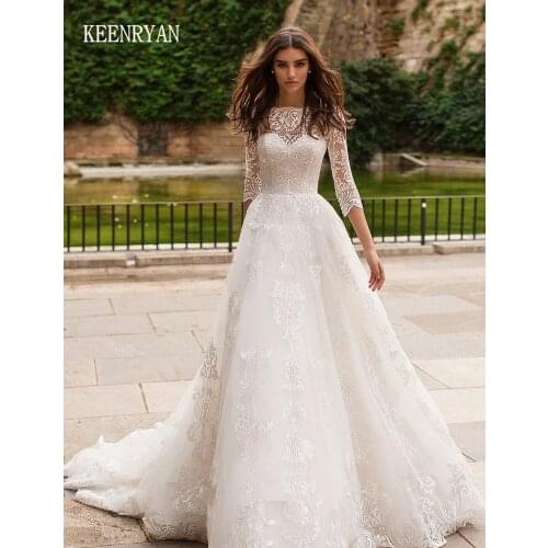 Vestido De Novia Luxury Beaded Lace Wedding Dress 2020 Half Sleeve Robe De Mariee Appliques Chaple Train Wedding Gowns