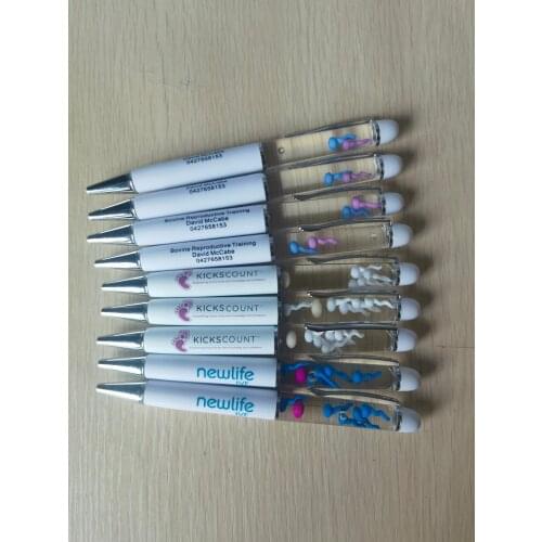 WHITE PEN BARREL 3D EGG SPERM FLOATER FLOATING WILL BE MOVED LEFT AND RIGHT WHEN YOU UP AND DOWN THE PEN FLOATING PEN