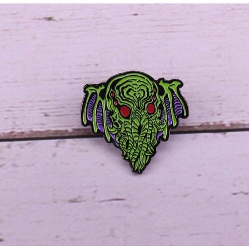 Cthulhu enamel pin probes the universe brooch