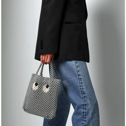 Spring and Summer New Beaded Handbag Personality Hundred Cartoon Big Eyes Hollow Hand-made Beads Woven One-shoulder Womens Bag