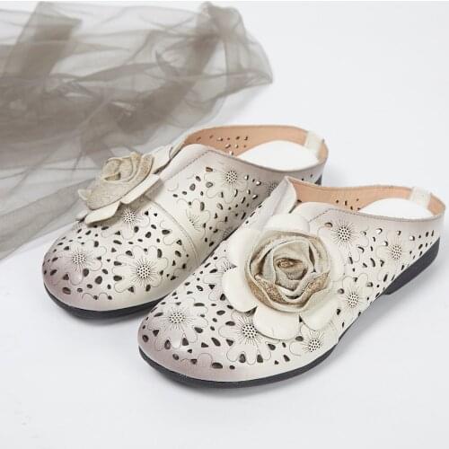 2019 summer new first layer cowhide flower baotou sandals and slippers leather hollow low heel