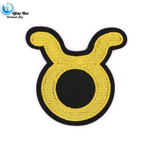 New 1 pcs size : 7.1*7.3cm Iron-on Embroidered Gold Taurus logo STYLE garment Appliques accessory patches Free shipping P-130