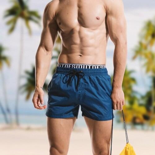 Solid quick dry beach shorts briefs men swimwear sunga vacation leisure board shorts swimsuit men sports fitness running shorts