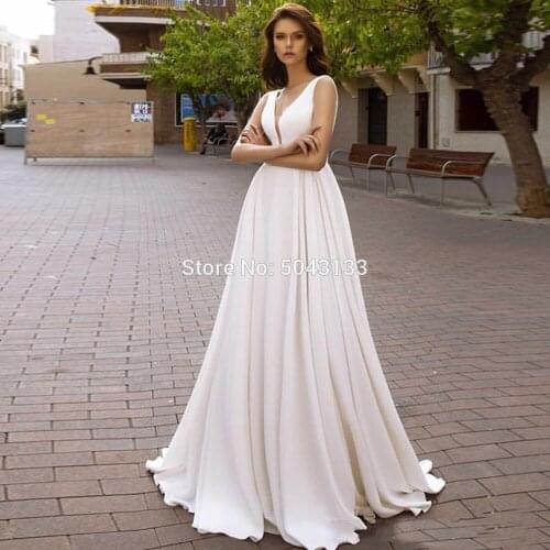 Simple Satin A-Line Wedding Dresses Vestidos de novia Deep V Neck Low Backless Long Bridal Dress Boho Wedding Gowns with Pockets