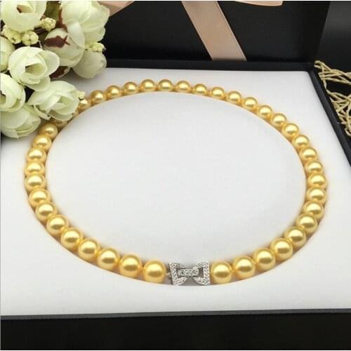 2017 New 924+++Natural nacre SHELL pearl necklace 10mm eccentric butterfly knot spot wholesale fashion