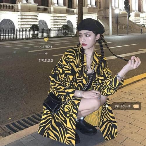 2021 new spring and summer suit female Korean long-sleeved leopard shirt jacket + black suspender skirt two-piece street retro