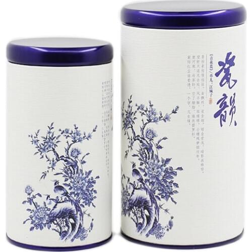 Xin Jia Yi Packaging Puer Flower Chinese Tea Round Paper Boxes For Gift Tea Coffee White And Blue Cardboard with Metal Lid Cans