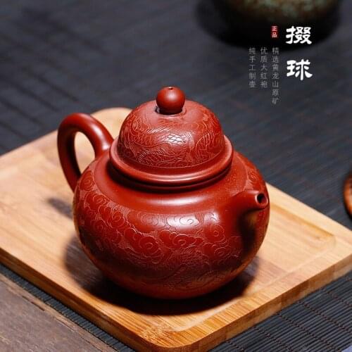 Wholesale yuzhongsha first-hand goods source: raw ore, Dahongpao, dragon pattern, painting and ball making pot for sale