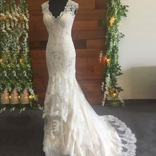 2020 Latest Charming Ivory Mermaid Lace Bridal Wedding Gowns Deep V Neckline Illusion Back Wedding Dresses for Bride Appliqued