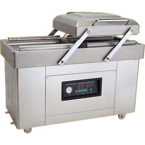 Double chamber vacuum packing machine