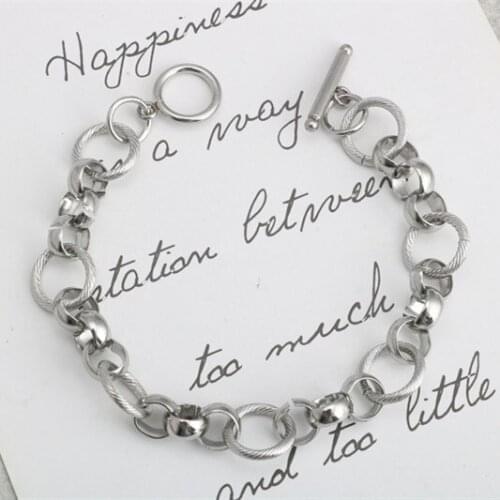 Fashion hand-made fancy OT buckle stainless steel O word men and women titanium steel word buckle bracelet hot sale